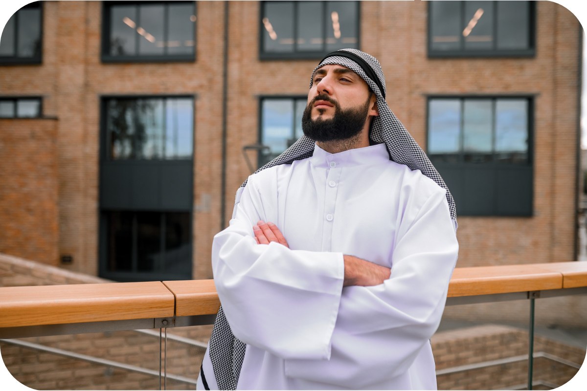 bearded middle eastern men in white thobe