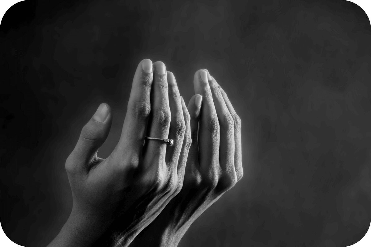 Hands raised for dua (prayer)