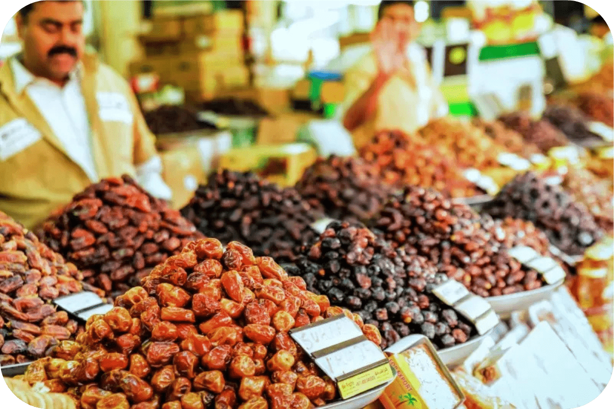 vendors selling dates in a market