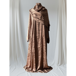 Perfect Gift Introducing our elegantly crafted Prayer Gown, designed for comfort, modesty, and ease of wear. Made from premium satin fabric, soft and flowing, it ensures comfort during your sacred moments. Why You’ll Love It✔️ One Size Fits All – Comfortable and modest for every body type.✔️ Wide & Loose Flowing Design – Graceful coverage with elegance.✔️ Premium Satin Fabric – Smooth, soft, and luxurious.✔️ Elasticated Wrists – Keeps sleeves neat while allowing free movement.✔️ Attached Scarf – Securely drapes without the need for pins.✔️ Elegant Design – Subtle shine and flowing silhouette for timeless elegance.✔️ Available Colours – Black, Cream, Brown, Light Blue, Pinkish Taupe. A perfect blend of modesty, comfort, and elegance &mdash; ideal for daily prayers or special occasions.