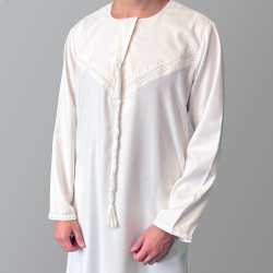 Perfect Gift This Thobe captures the spirit of simplicity, mobility, and practicality, reflecting the everyday wearability of the Thobe. This garment is both rooted in tradition and suited for modern, active lifestyles, much like the nomadic way of life that has shaped Emirati culture. Material: Wool and Polyester blendFeatures:Embroidery on the chest and sleevesHidden zip for a seamless designDetachable tasselSide pockets