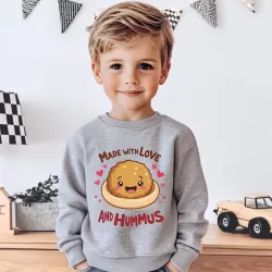 Perfect Gift Toddler Sweatshirt – "Made with Love and Hummus" Falafel Design Wrap your little one in comfort and cuteness with this adorable Rabbit Skins 3371 Toddler Sweatshirt featuring a playful cartoon falafel, hearts, and the cheerful phrase "Made with Love and Hummus". Perfect for kids who bring joy to the table—just like hummus and falafel! Product Highlights: Charming Design: Features a whimsical cartoon falafel with hearts and a fun, foodie-inspired message that’s sure to bring smiles. Soft and Cozy Fabric: Made from a premium cotton/poly blend, this sweatshirt is soft on delicate skin while providing lasting durability. Versatile Colors: Available in Grey and Heather Grey, perfect for everyday wear or special occasions. Details: Material: 60% cotton, 40% polyester fleece for a warm, comfy fit. Fit: Toddler sizing with ribbed cuffs and waistband for a snug and secure fit. Easy Care: Machine washable, ensuring parents love it as much as kids do! Whether it’s for a cozy day at home, a fun outing, or a foodie-themed photo op, this sweatshirt makes a unique and thoughtful gift for little hummus lovers. Order now to add a little extra love and hummus to their wardrobe! EU representative: Floral Delights Co., emmamansour@me.com, 1433 N 1075 W, Farmington, UT, 84025, US Product information: Rabbit Skins 3317, 2 year warranty in EU and Northern Ireland as per Directive 1999/44/EC Care instructions: Machine wash: cold (max 30C or 90F), Non-chlorine: bleach as needed, Tumble dry: low heat, Iron, steam or dry: medium heat, Do not dry clean