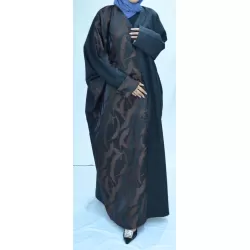 Perfect Gift EDITOR'S NOTE Our first suede abaya! Half embroidered with beautiful rust coloured detail. *If your size is sold out, email us to pre-order* Matching scarf is not included.  Made in the UAE.    SIZE/FIT Models wear: Abaya size 58 Models' height: 5ft 7inches/167 cm and 5ft 4inches/163  PRODUCT DETAILS/CARE Wash care: Hand wash 30oC, Do not tumble dry and low heat iron.  PLEASE NOTE SOME OF THE COLOURS MAY VARY SLIGHTLY IN REAL DUE TO THE LIGHTING AND BRIGHTNESS ON COMPUTER SCREENS