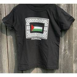 Perfect Gift Crafted with premium quality fabric and designed for comfort, this t-shirt is more than just apparel; it's a statement of unwavering support and pride. The Keffiyeh frame beautifully encapsulates the shirt, symbolising tradition, culture, and resilience, while the colours of the Palestinian flag - red, green, white, and black - proudly adorn the centre, echoing the spirit and history of Palestine. Join the movement, stand tall, and make a statement with the Black Unisex T-shirt. Wear your support for Palestine proudly and make a powerful impact with every step you take. Available in sizes 3/4 years - 12-/13 years Size gide:Small&nbsp;3/4 years - 26" / 66cm Medium&nbsp;5/6 years - 28" / 71cm Large&nbsp;7/8 years - 30" / 76cm XL&nbsp;9/11 years - 32" / 81cm 2XL&nbsp;12/13 years - 34" / 86cm100% Organic Cotton&nbsp; &nbsp; &nbsp; &nbsp; &nbsp; &nbsp; &nbsp; &nbsp; &nbsp; &nbsp;&nbsp; N.B: As all apparel is printed in-house please allow up to 2 weeks for delivery. Should you need the items sooner, please contact us and we do our best to help you Insha Allah.
