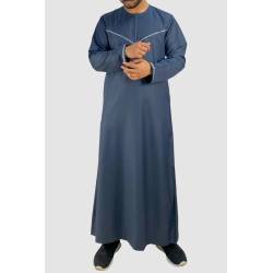 Perfect Gift This Omani thobe is simple in style and has discreet stitching on the chest and arms, with a zip for opening.  The V-shaped design adds some interest to the otherwise plain thobe, and can create a slimming effect by drawing the eyes up and down instead of side-to-side. It has a shiny appearance, making it suitable for parties.  You can wear it with a waistcoat, or on its own with a contrasting hat or Emirati headdress for special occasions. Material: Polyester Colours: Navy Blue, Blue, Grey, Black Sizes: Available in 60,62 L,XL,XXL 5Size 60,626 (2x: L, XL, XXL )