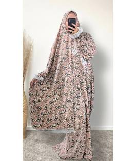 Perfect Gift  One Size Only (52" - 64") fits UK sizes 8 to 24.  62-64”/160cm- Standard Length: The dress is designed to be long enough to cover your feet while praying Salah. If you would like to adjust the length, please click on the 'Tailored Length' option and specify your preferred length in the 'Order Notes' section at checkout, or email us, and we will confirm the change via email. You can refer to the size chart below to help you determine the suitable length  83cm - Width of dress : This refers to one side of the dress when laid flat, making the full circumference approximately 166cm. The dress is intentionally designed to be wide and oversized for a modest, full-coverage fit.  75cm - Sleeve length (from wrist to shoulder) Hijab Measurements: 210 cm (Length) x 60 cm (Width) Optional: You can choose to have the hijab attached or separate from the abaya Attached Hijab: The hijab will be attached with the short side on the right allowing the long side to be wrapped with your left hand.&nbsp; If you prefer a right - handed wrapping arrangement, please add a note in the 'Order notes' section at checkout, or email us, and we will confirm the change via email. You must notify me within 24 hours before I proceed with sewing the custom attachment. Invisible side pockets Elastic cuff finished  Lace finish on the cuff and hijab&nbsp;  Material - Polyester Crepe Colour - Pink