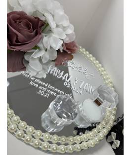 Perfect Gift Personalised Nikkah Wedding Ring Plates – Elegant Islamic Wedding Decor Enhance your Nikkah ceremony with our stunning personalised wedding ring plates, designed to celebrate love and commitment. Each plate is custom-crafted with exquisite detail, featuring names, dates, or meaningful messages, making it a perfect addition to your Islamic wedding decor. Our Nikkah ring plates beautifully combine tradition and modern elegance, serving as a timeless keepsake of your special day. Whether as a centrepiece during the ceremony or a cherished memento, these plates are ideal for couples who value unique and personal touches in their wedding celebrations. Celebrate your union with a piece that reflects your love and individuality. Perfect for gifting or enhancing your Muslim wedding ceremony decor. WHEN PLACING AN ORDER, PLEASE REFER TO THE 'ADD A NOTE' SECTION AND INCLUDE:&nbsp;  1) NAMES&nbsp;- Please enter these in the order you'd like them displayed. Or if you'd just prefer initials. 2) DATE&nbsp;- We can print either the English calendar date or the Islamic calendar, please specify which you would like.&nbsp; 3)&nbsp;SHORT QUOTE -&nbsp;If you would like one. Not everyone chooses to have one.&nbsp; Here are some examples:  And We created you in pairs.&nbsp;78:8 And He placed between you affection and mercy.&nbsp;30:21  4)&nbsp;FONT COLOUR -&nbsp;White, Gold or Black. The most common is the White.