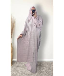 Perfect Gift  One Size Only (52" - 64") fits UK sizes 8 to 24.  62-64”/160cm- Standard Length: The dress is designed to be long enough to cover your feet while praying Salah. If you would like to adjust the length, please click on the 'Tailored Length' option and specify your preferred length in the 'Order Notes' section at checkout, or email us, and we will confirm the change via email. You can refer to the size chart below to help you determine the suitable length  83cm - Width of dress : This refers to one side of the dress when laid flat, making the full circumference approximately 166cm. The dress is intentionally designed to be wide and oversized for a modest, full-coverage fit.  75cm - Sleeve length (from wrist to shoulder) Hijab Measurements: 210 cm (Length) x 60 cm (Width) Optional: You can choose to have the hijab attached or separate from the abaya Attached Hijab: The hijab will be attached with the short side on the right allowing the long side to be wrapped with your left hand.  If you prefer a right - handed wrapping arrangement, please add a note in the 'Order notes' section at checkout, or email us, and we will confirm the change via email. You must notify me within 24 hours before I proceed with sewing the custom attachment. Invisible side pockets Shirred cuff finished - Elasticated, gathered cuff with stitched rows that create a soft ruffle at the wrist.  Material - Pleat Colour - Pink