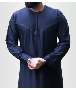 Perfect Gift Our simple yet elegant Omani/Emirati style Thobe.&nbsp; The contrast stitching on the chest and sleeves adds a touch of elegance and sophistication to the Thobe, making it stand out from other traditional attire. Material: Wool and Polyester blendFeatures:Contrast stitching on the chest and sleevesMatching zip on Placket2 side pockets