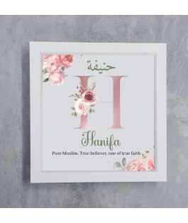 Perfect Gift Celebrate the arrival of a precious little one with our Personalised Islamic Baby Name Box Frame! This stunning deep box frame features the baby’s name in beautiful Arabic calligraphy along with its meaning, creating a unique and meaningful addition to any nursery or a perfect gift for new parents. Custom-made to reflect the uniqueness of the child’s name, this elegant frame is a timeless keepsake that will be cherished for years. Size: 20X20CM printFrame size 24cm x 24cmDeep 3.5CM Material: Deep shadow box frame with Glass cover Materials & care Frame/ Inside frame:Fibreboard Front protection:The front of the Frame has a Glass FRAME please clean this with a duster Printed on a high quality lustre paper which has a lovely sheen to it. Display Options: Ready to hang on the wall which has a hook at the back. Screws are not included.Features:Customised with the baby’s name in Arabic and its beautiful meaningElegant, Islamic-inspired designs perfect for nurseries or kids’ roomsHigh-quality print with vibrant colours that won’t fade over timeA thoughtful and unique gift for newborns, baby showers, aqiqah, or Eid celebrationsHow to Personalise:Enter the Baby’s Name: Provide the baby’s name in English, please also send the Arabic.Include the Meaning: Add the meaning of the name.Perfect For:Newborn baby giftsMuslim baby showers and aqiqah giftsNursery wall decor and baby room artEid gifts for babiesUnique keepsake for proud parentsShipping & Returns:Ships within 3-5 business days.Packaged securely to ensure it arrives safely and in perfect condition.